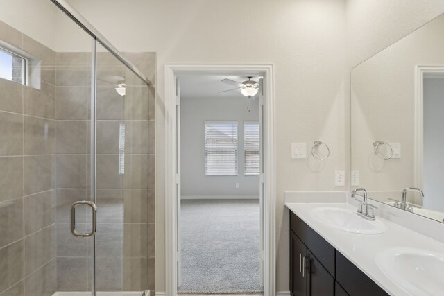 519 Willet Dr, Mckinney, TX 75069 - full bath featuring a ceiling fan, a stall shower, double vanity, and baseboards