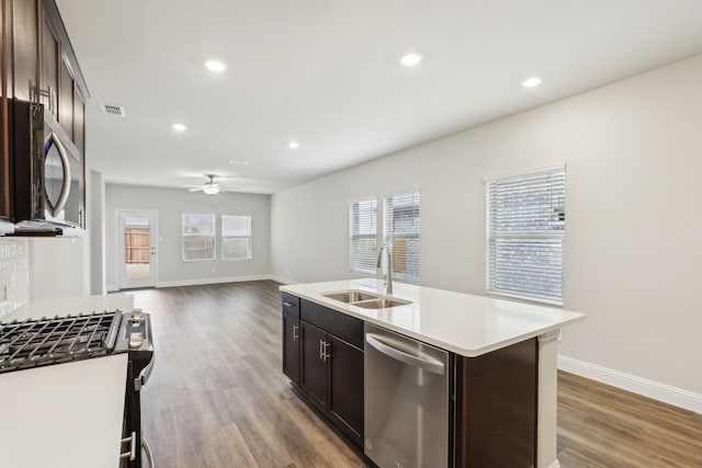 519 Willet Dr, Mckinney, TX 75069 - kitchen featuring stainless steel appliances, a sink, plenty of natural light, wood finished floors, and recessed lighting