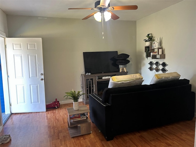 1004 Church St, Sulphur Springs, TX 75482 - living room with ceiling fan and wood finished floors