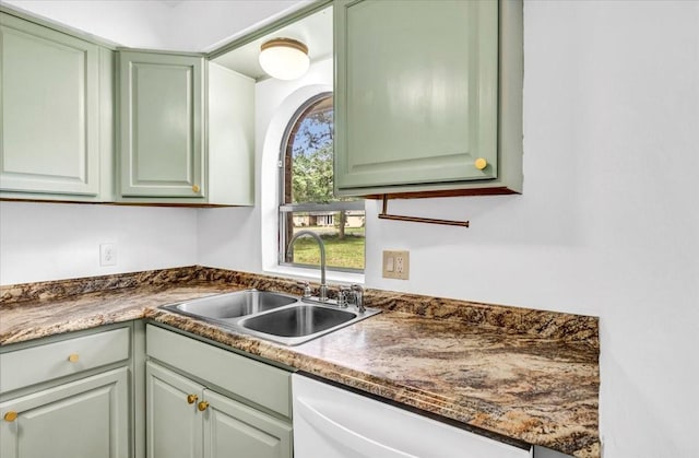 415 Lone Star Ln, Hideaway, TX 75771 - kitchen featuring a sink, green cabinetry, white dishwasher, and dark countertops