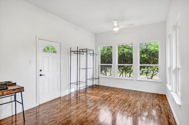 415 Lone Star Ln, Hideaway, TX 75771 - entrance foyer with ceiling fan, wood finished floors, healthy amount of natural light, and baseboards