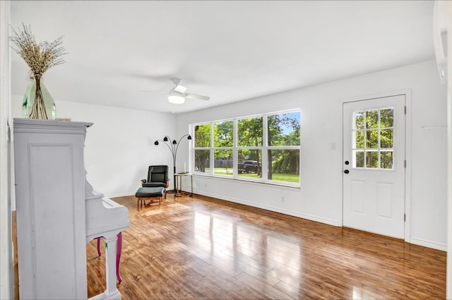 415 Lone Star Ln, Hideaway, TX 75771 - unfurnished room featuring plenty of natural light, a ceiling fan, and wood finished floors