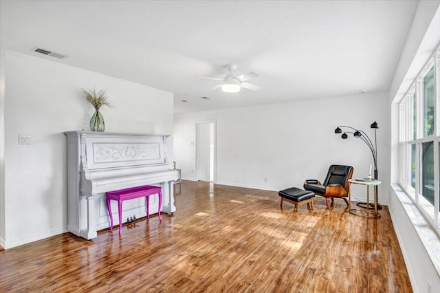 415 Lone Star Ln, Hideaway, TX 75771 - living area with wood finished floors, baseboards, and ceiling fan