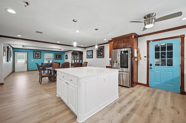 2800 E Fm 4, Cleburne, TX 76031 - kitchen featuring stainless steel refrigerator with ice dispenser, ornamental molding, light wood-style floors, baseboards, and recessed lighting