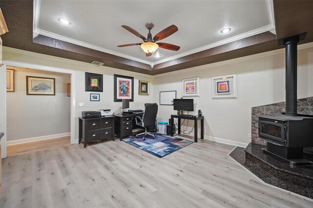 2800 E Fm 4, Cleburne, TX 76031 - office space with crown molding, light wood-style floors, a ceiling fan, a wood stove, and baseboards