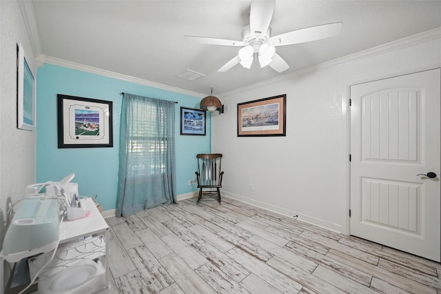 2800 E Fm 4, Cleburne, TX 76031 - sitting room with ornamental molding, ceiling fan, light wood-type flooring, and baseboards