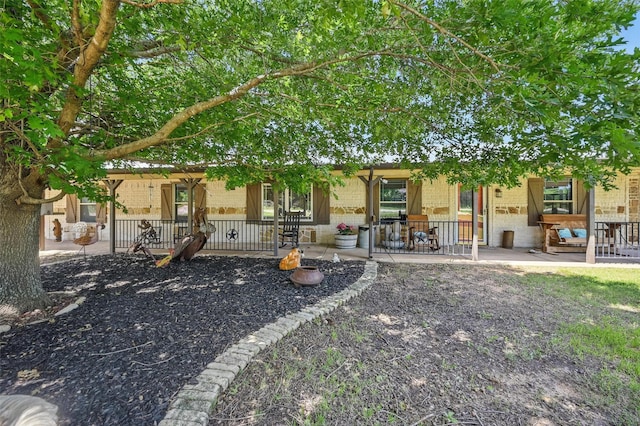 2800 E Fm 4, Cleburne, TX 76031 - back of house with a porch and brick siding