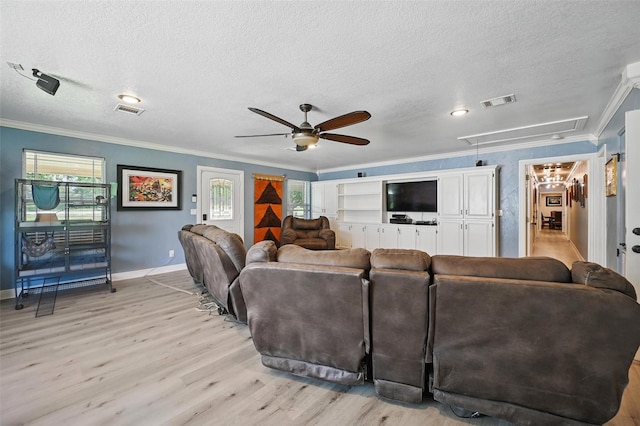 2800 E Fm 4, Cleburne, TX 76031 - living room featuring attic access, crown molding, light wood-type flooring, a ceiling fan, and baseboards
