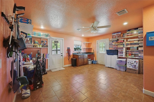 2800 E Fm 4, Cleburne, TX 76031 - office area featuring healthy amount of natural light, ceiling fan, a textured ceiling, baseboards, and recessed lighting