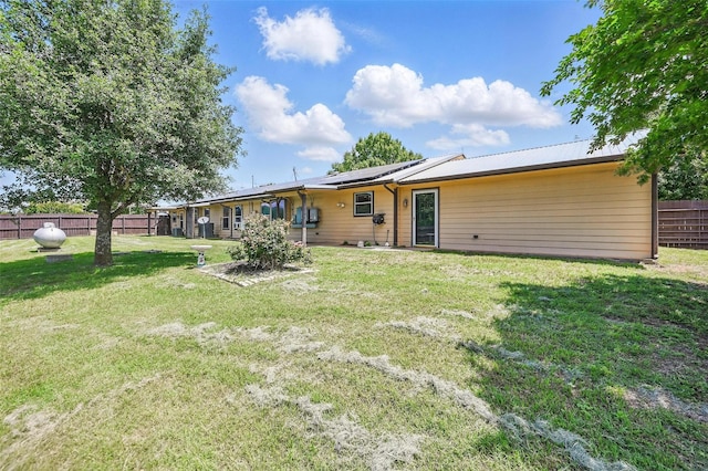 2800 E Fm 4, Cleburne, TX 76031 - back of house with roof mounted solar panels and metal roof