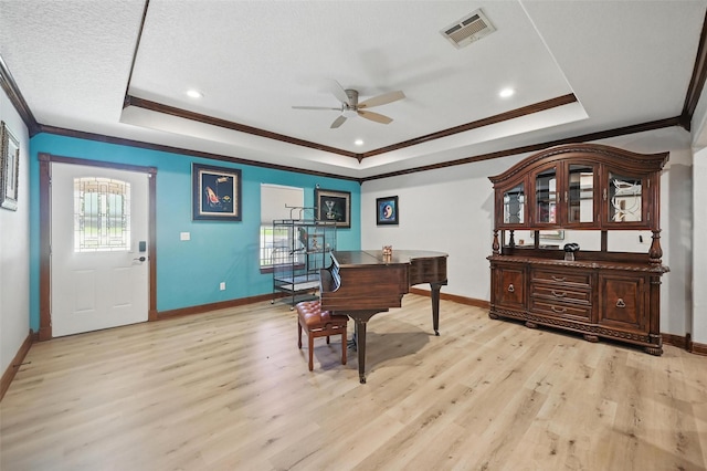 2800 E Fm 4, Cleburne, TX 76031 - office space with ornamental molding, a raised ceiling, baseboards, light wood-style flooring, and ceiling fan