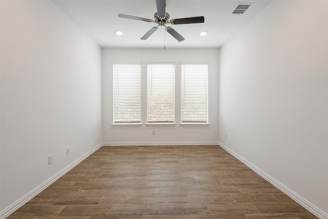 3104 Lakewood Bluffs Trl, Lewisville, TX 75010 - empty room with wood finished floors, a ceiling fan, baseboards, and recessed lighting