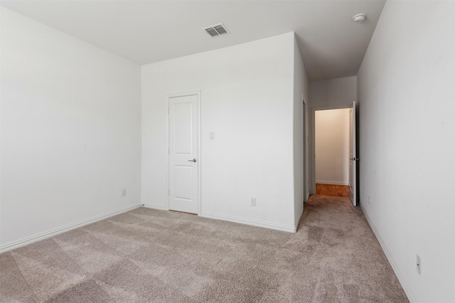 3104 Lakewood Bluffs Trl, Lewisville, TX 75010 - spare room featuring light carpet and baseboards
