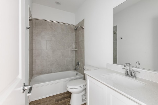 3104 Lakewood Bluffs Trl, Lewisville, TX 75010 - full bathroom with toilet, shower / tub combination, wood finished floors, and vanity