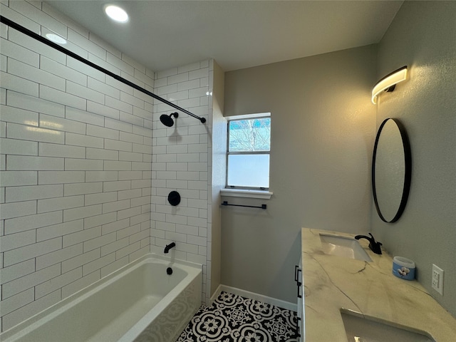 608 S Seaman St, Eastland, TX 76448 - full bath with baseboards, bathtub / shower combination, vanity, and tile patterned flooring