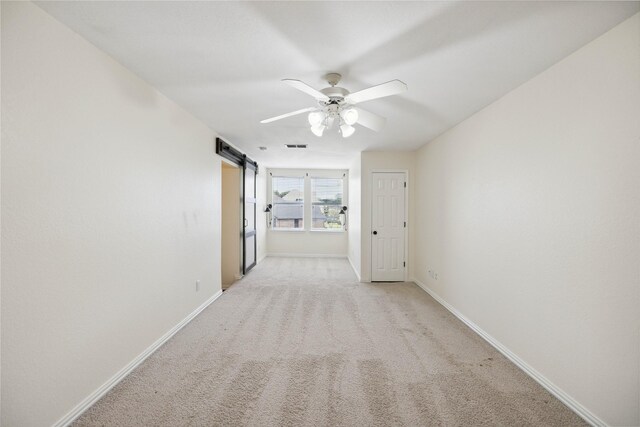 3517 Grants Lndg, Fort Worth, TX 76179 - corridor featuring a barn door, baseboards, and light colored carpet