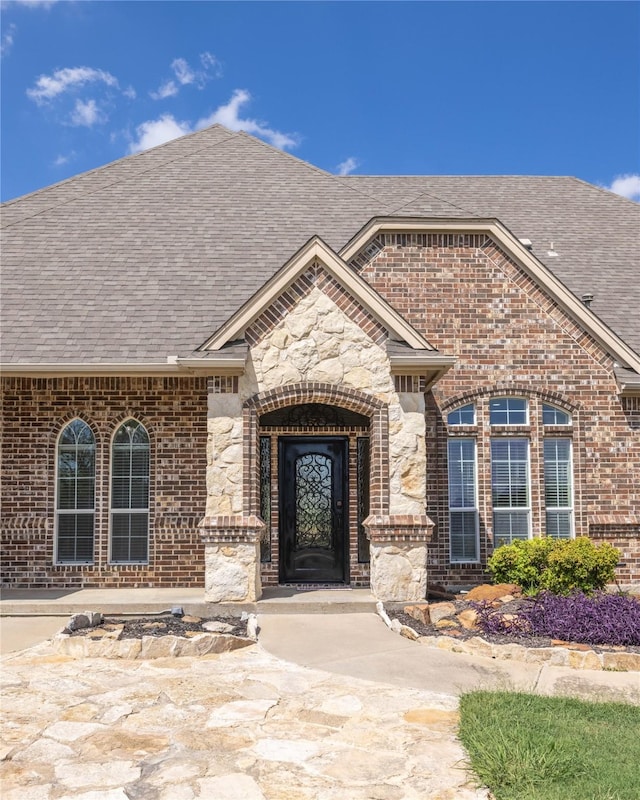 3517 Grants Lndg, Fort Worth, TX 76179 - property entrance with brick siding and roof with shingles
