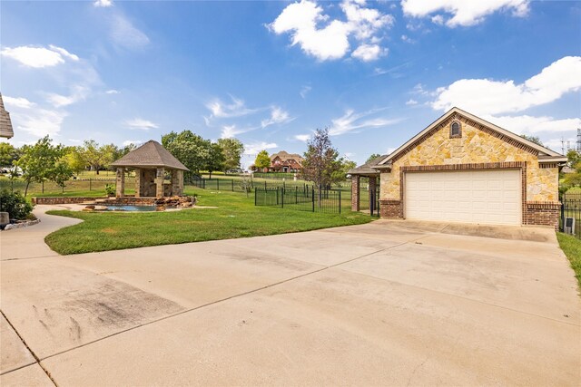 3517 Grants Lndg, Fort Worth, TX 76179 - view of side of home with a gazebo, driveway, stone siding, a garage, and brick siding