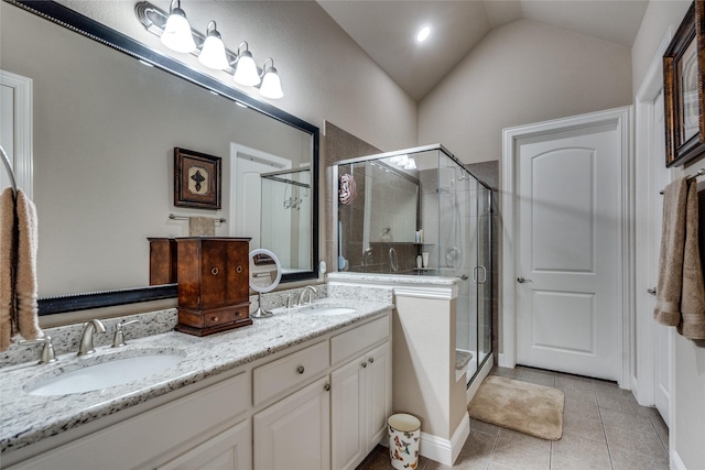 5413 Rowlett Creek Way, Mckinney, TX 75070 - bathroom with tile patterned floors, double vanity, a shower stall, and lofted ceiling