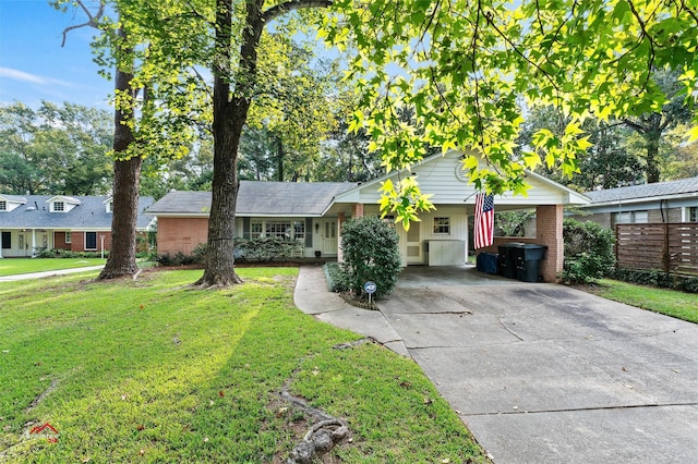 6237 Dillingham Ave, Shreveport, LA 71106 - view of front of house featuring driveway, a carport, and brick siding