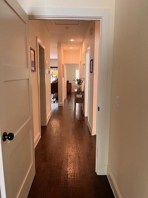 406 Barnes St, Mckinney, TX 75069 - hallway featuring dark wood finished floors and baseboards
