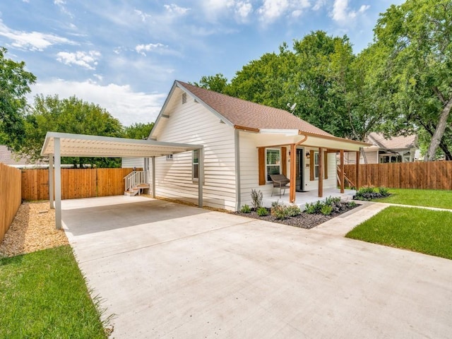 406 Barnes St, Mckinney, TX 75069 - view of front of home with driveway, a porch, and a carport