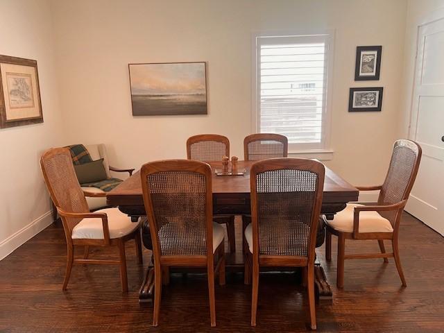 406 Barnes St, Mckinney, TX 75069 - dining area with baseboards and wood finished floors