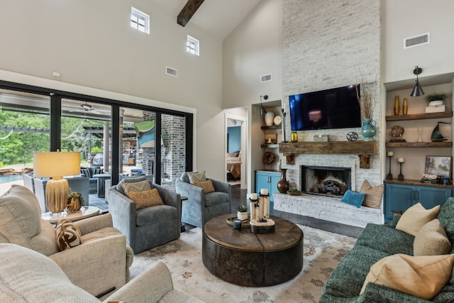 7404 Sandy Lake Rd, Quinlan, TX 75474 - living area with high vaulted ceiling, healthy amount of natural light, a large fireplace, and beamed ceiling