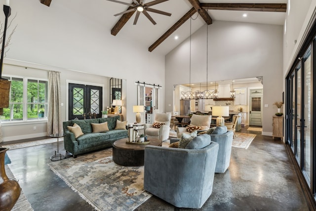 7404 Sandy Lake Rd, Quinlan, TX 75474 - living area with finished concrete flooring, high vaulted ceiling, beamed ceiling, ceiling fan, and baseboards