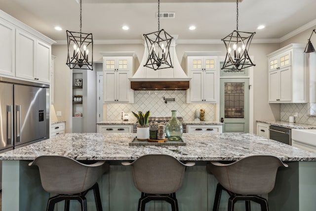 7404 Sandy Lake Rd, Quinlan, TX 75474 - kitchen with backsplash, white cabinetry, glass insert cabinets, recessed lighting, and crown molding
