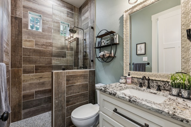 7404 Sandy Lake Rd, Quinlan, TX 75474 - full bathroom with vanity, toilet, and a walk in shower