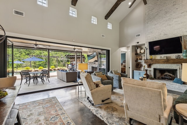 7404 Sandy Lake Rd, Quinlan, TX 75474 - living room featuring a brick fireplace, concrete flooring, high vaulted ceiling, ceiling fan, and beam ceiling