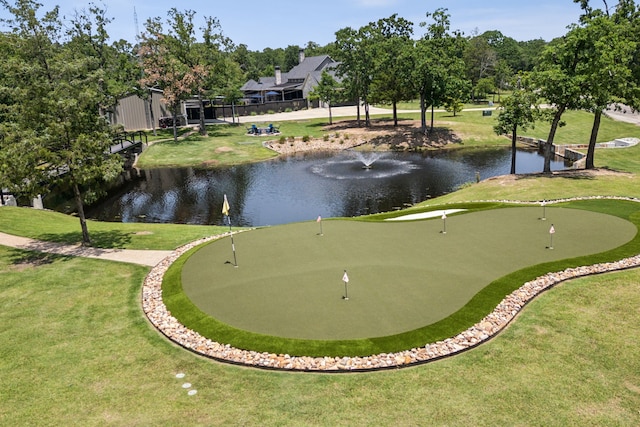 7404 Sandy Lake Rd, Quinlan, TX 75474 - surrounding community with a water view, an area to practice putting, and a yard