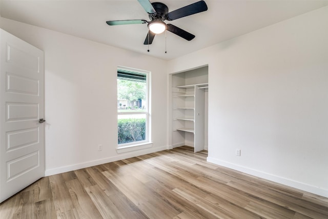 1106 Spring Lake Dr, Garland, TX 75043 - unfurnished bedroom featuring light wood-style flooring, baseboards, a closet, and ceiling fan