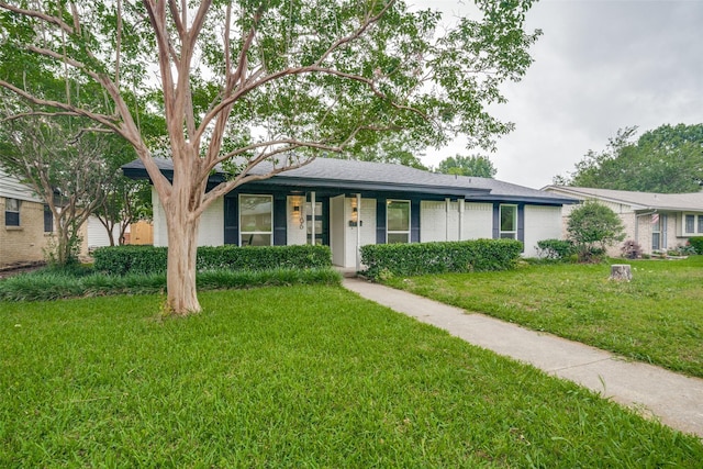 1106 Spring Lake Dr, Garland, TX 75043 - ranch-style home featuring a front lawn