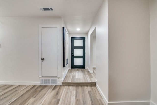1106 Spring Lake Dr, Garland, TX 75043 - entryway with wood finished floors and baseboards