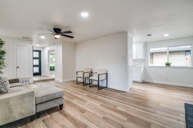 1106 Spring Lake Dr, Garland, TX 75043 - living room featuring recessed lighting, ceiling fan, light wood-type flooring, and baseboards
