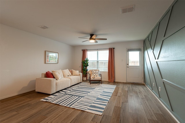 723 Cochran Dr, Princeton, TX 75407 - living area with light wood-style flooring, ceiling fan, and baseboards