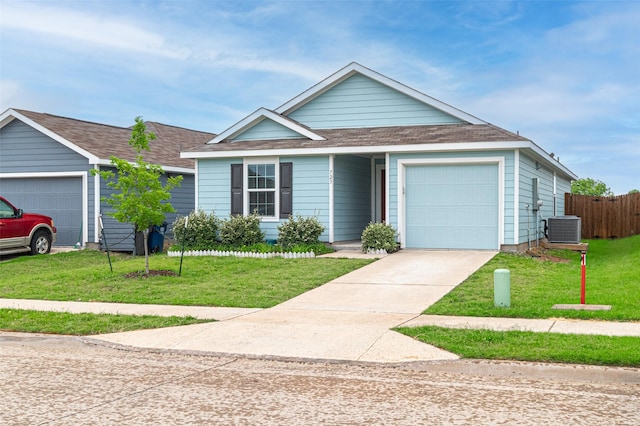 723 Cochran Dr, Princeton, TX 75407 - single story home featuring central air condition unit, an attached garage, driveway, and roof with shingles