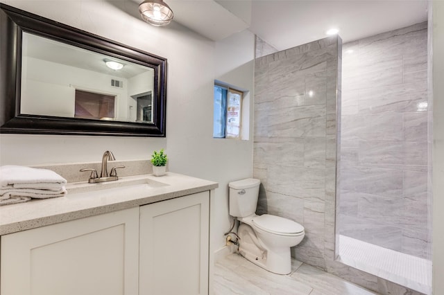 606 Quiram Ln, Kemp, TX 75143 - bathroom with toilet, vanity, a walk in shower, and marble look tiles