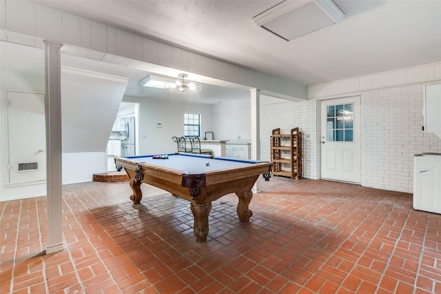 606 Quiram Ln, Kemp, TX 75143 - recreation room featuring brick flooring, brick wall, and pool table