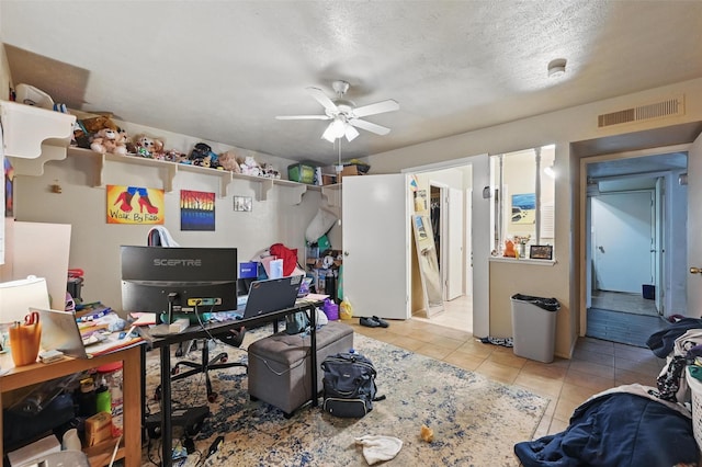 407 Mckinley St, Cedar Hill, TX 75104 - office area featuring tile patterned floors, a ceiling fan, and a textured ceiling