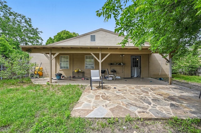 407 Mckinley St, Cedar Hill, TX 75104 - rear view of house with a patio area