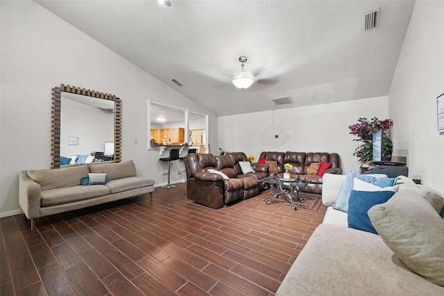 407 Mckinley St, Cedar Hill, TX 75104 - living room with vaulted ceiling, ceiling fan, dark wood-style flooring, and baseboards