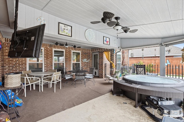 568 Willowview Dr, Saginaw, TX 76179 - view of patio featuring outdoor dining space, a ceiling fan, and a jacuzzi