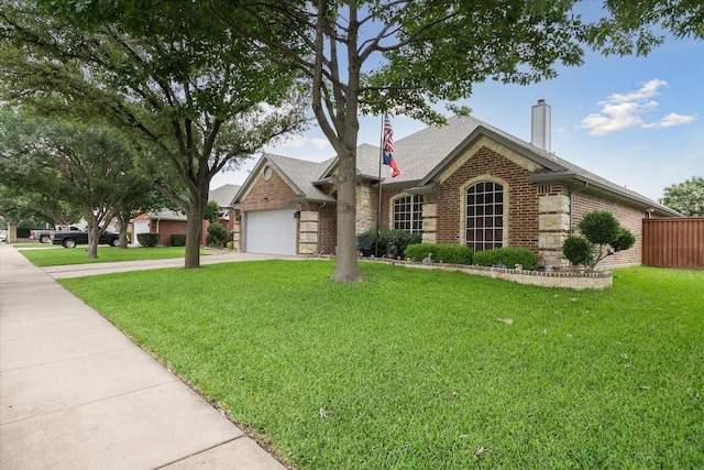 568 Willowview Dr, Saginaw, TX 76179 - view of front facade with brick siding, a chimney, driveway, a garage, and roof with shingles