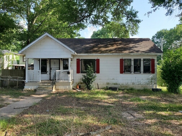 201 E Egan St, Shreveport, LA 71101 - view of front of house featuring a shingled roof and a porch