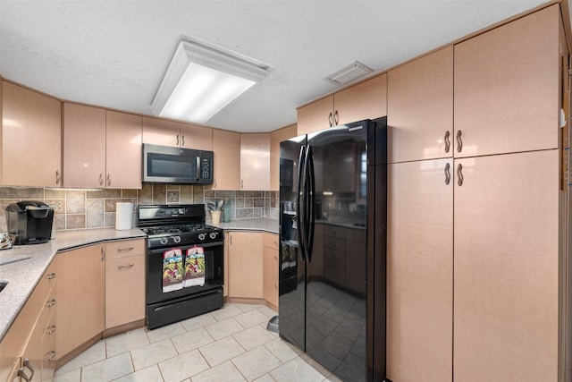 3245 Gail Ct, Irving, TX 75060 - kitchen with black appliances, light tile patterned floors, light brown cabinetry, and backsplash