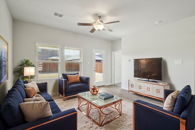 511 Willet Dr, Mckinney, TX 75069 - living area featuring a ceiling fan, light wood-type flooring, and baseboards