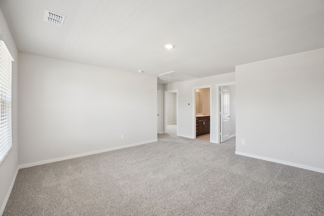 511 Willet Dr, Mckinney, TX 75069 - unfurnished room featuring attic access, light carpet, baseboards, and recessed lighting